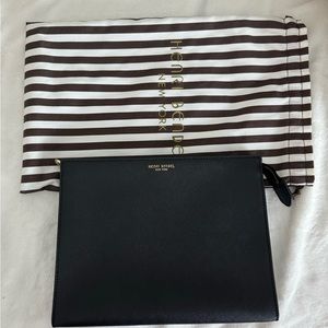 Henri Bendel cluth or can be used as cosmetic bag.